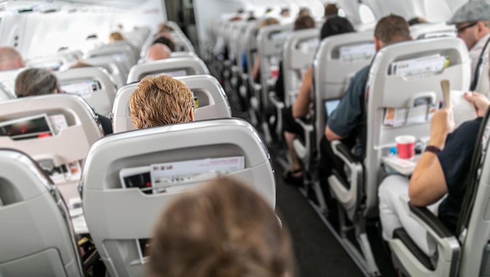 Crowded commercial airliner.